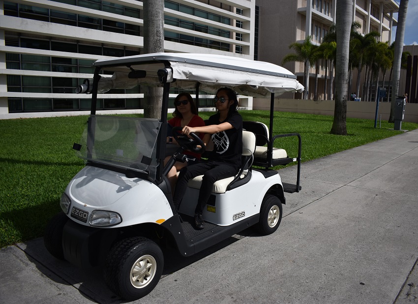 ILL student workers making deliveries on Boca Campus
