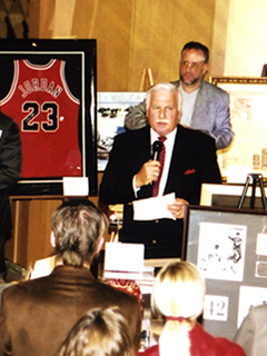 Photograph of Howard Schnellenberger talking to a crowd of people